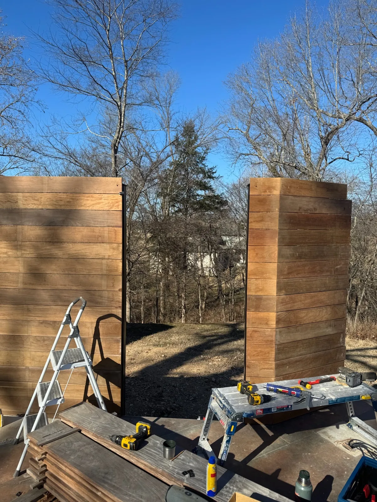 Two ipe wall panels forming a corner gate