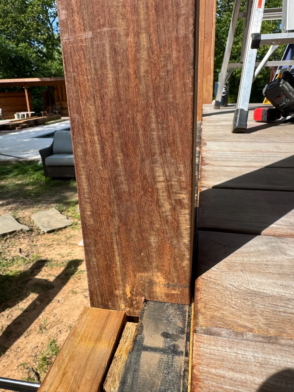 Ipe post corner joint above deck boards